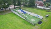 Luchtfoto van het multifunctionele beweegpark met keerwanden als basis